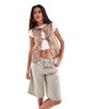 Reclaimed Vintage tie front vest in animal print
