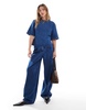 ASOS DESIGN denim jersey barrel wide leg jeans in mid blue