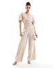 ASOS DESIGN ruched front cut out back jumpsuit in beige