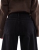 Bershka Petite high waist wide leg jeans in black
