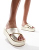 ASOS DESIGN Thunder padded cross strap flatform sandals in gold