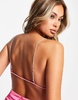 Amy Lynn backless satin bodycon dress with ruffle hem in pink
