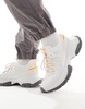 ASOS DESIGN chunky knit sneakers in white and orange