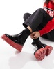 ASOS DESIGN Giana chunky chelsea rain boots in black and red