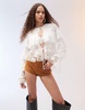 ASOS DESIGN tie front layered ruffle blouse with lace inserts in ivory