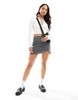 Bershka strap detail ribbed knitted top in white