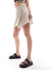 Monki linen wrap tie detail mini skirt in beige