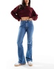 ASOS DESIGN mid rise flare jeans in authentic dark midwash
