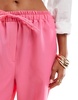 ASOS DESIGN tailored pull on pants in pink