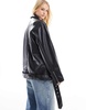 ASOS DESIGN Tall longline oversized faux leather biker jacket in black