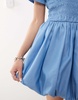 Amy Lynn Eleanor puffball mini dress in blue chambray