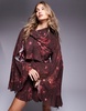 ASOS DESIGN mini dress with asymmetric cowl back detail and ruffles in cosmic burgundy print