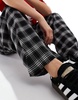 Bershka tie waist wide leg pants in black check