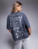 ASOS DESIGN unisex oversized license t-shirt with Bugs Bunny Looney Tunes prints in washed black