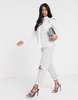 River Island Petite frill shoulder detail top in white