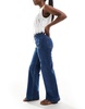 Bershka high waisted pocket detail jeans in mid wash