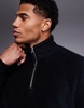 ASOS DESIGN quarter zip fleece sweatshirt in black