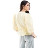 ASOS DESIGN cotton poplin tie front peplum blouse in pastel buttermilk
