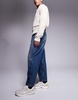 ASOS DESIGN balloon fit jeans with vintage tint in mid dark wash blue