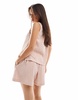 ASOS DESIGN textured pull on flippy shorts in rose stripe - part of a set