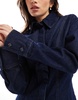 ASOS DESIGN denim shirt in rinse wash with cinch waist