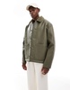 ASOS DESIGN faux leather oversized teddy lined worker jacket in green