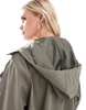 ASOS DESIGN Petite rubberized rain hooded trench coat with belt detail in khaki