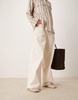 ASOS DESIGN Lysandra leather high-vamp ballet flats in off-white weave