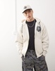 Aape by A Bathing Ape logo zip up hoodie in beige