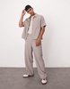Bershka wide leg plisse pants in light brown - part of a set