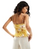 ASOS DESIGN shirred peplum cami sun top in yellow floral print