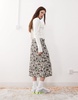 Reclaimed Vintage slinky midi skirt in mini cow print