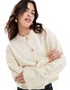 ASOS DESIGN crew neck cardigan with gold button detail in cream