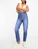 Bershka Petite comfort fit mom jeans in mid blue