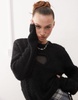 Monki fluffy sweater with cut out heart in black