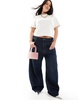 ASOS DESIGN beaded grab clutch bag in pink