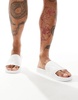 ASOS DESIGN sliders in white
