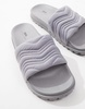 ASOS DESIGN slide sandals in gray with cleated soles