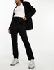 ASOS DESIGN Petite jersey tapered suit pants in black
