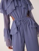ASOS DESIGN exaggerated ruffle sleeve jumpsuit with cut out waist in blue