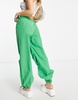 Bershka baggy parachute tech pants in green