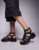 ASOS DESIGN gladiator sandals with studs on chunky soles in black