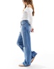 Bershka ripped knee wide leg jeans in mid blue