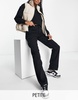 Bershka Petite straight leg jean in black