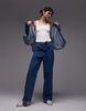 Lacoste baggy fit denim jeans in midwash blue with constrast stitching - part of a set