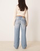 ASOS DESIGN baggy jean with rips in mid blue