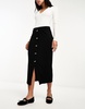 ASOS DESIGN ribbed midi skirt with horn buttons in black