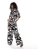 ASOS DESIGN cheesecloth tie waist wide pull on pants in print