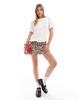 ASOS DESIGN broderie trim collarless blouse in white