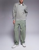 ASOS DESIGN wide leg smart pants in green with cargo pockets